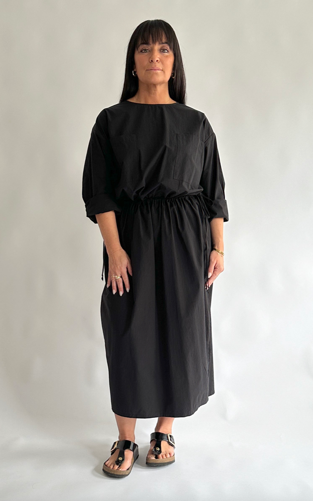 
                      
                        Drawstring Pocket Dress in Black
                      
                    