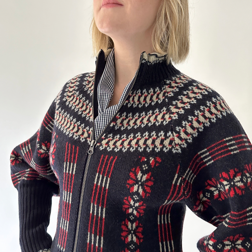 
                      
                        Ayala Cardigan in Navy & Red
                      
                    