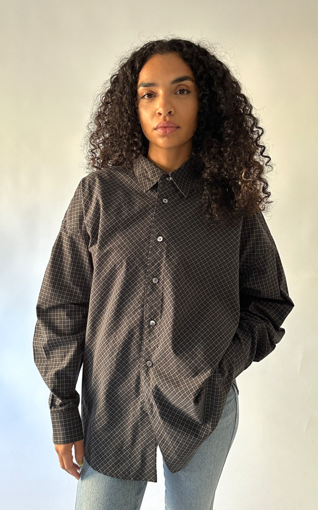 
                      
                        New Uniform Shirt in Black Plaid
                      
                    