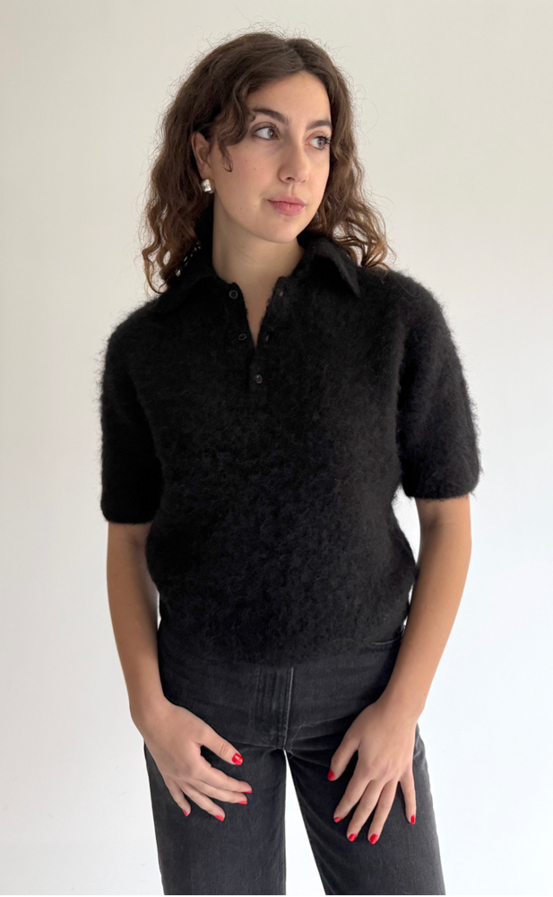 
                  
                    Compact Knit Polo in Black
                  
                