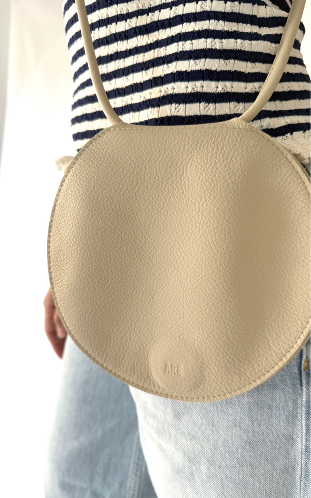 
                  
                    Disc Bag in Almond
                  
                