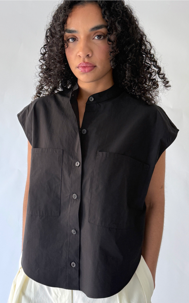 
                  
                    Sleeveless Button Up in Black
                  
                