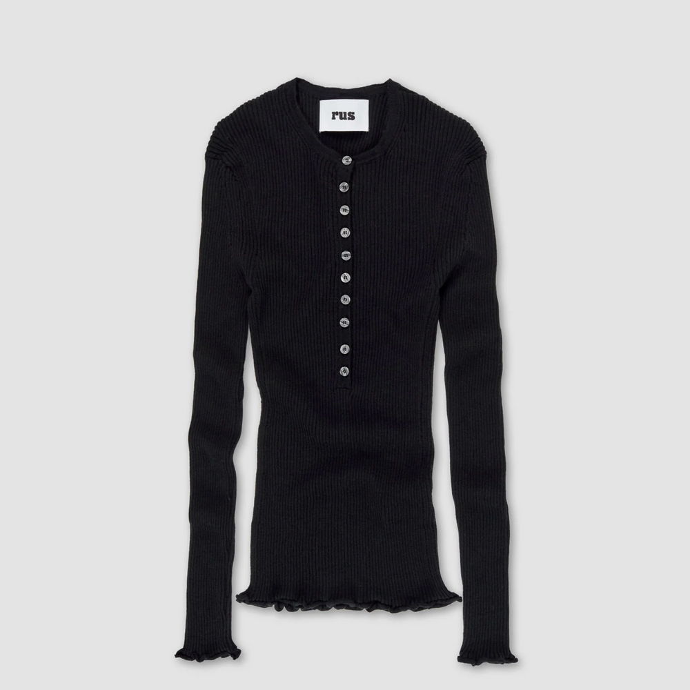 
                      
                        Camino Henley Sweater in Black
                      
                    